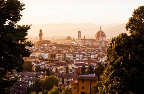 Φωτογραφία Elevated view over the city of Florence at sunset, Gary Yeowell