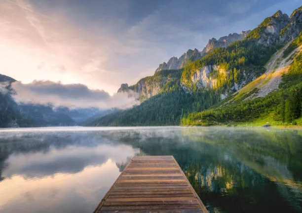 Φωτογραφία Fantastic Sunrise Scene with Fog Over, Ratnakorn Piyasirisorost