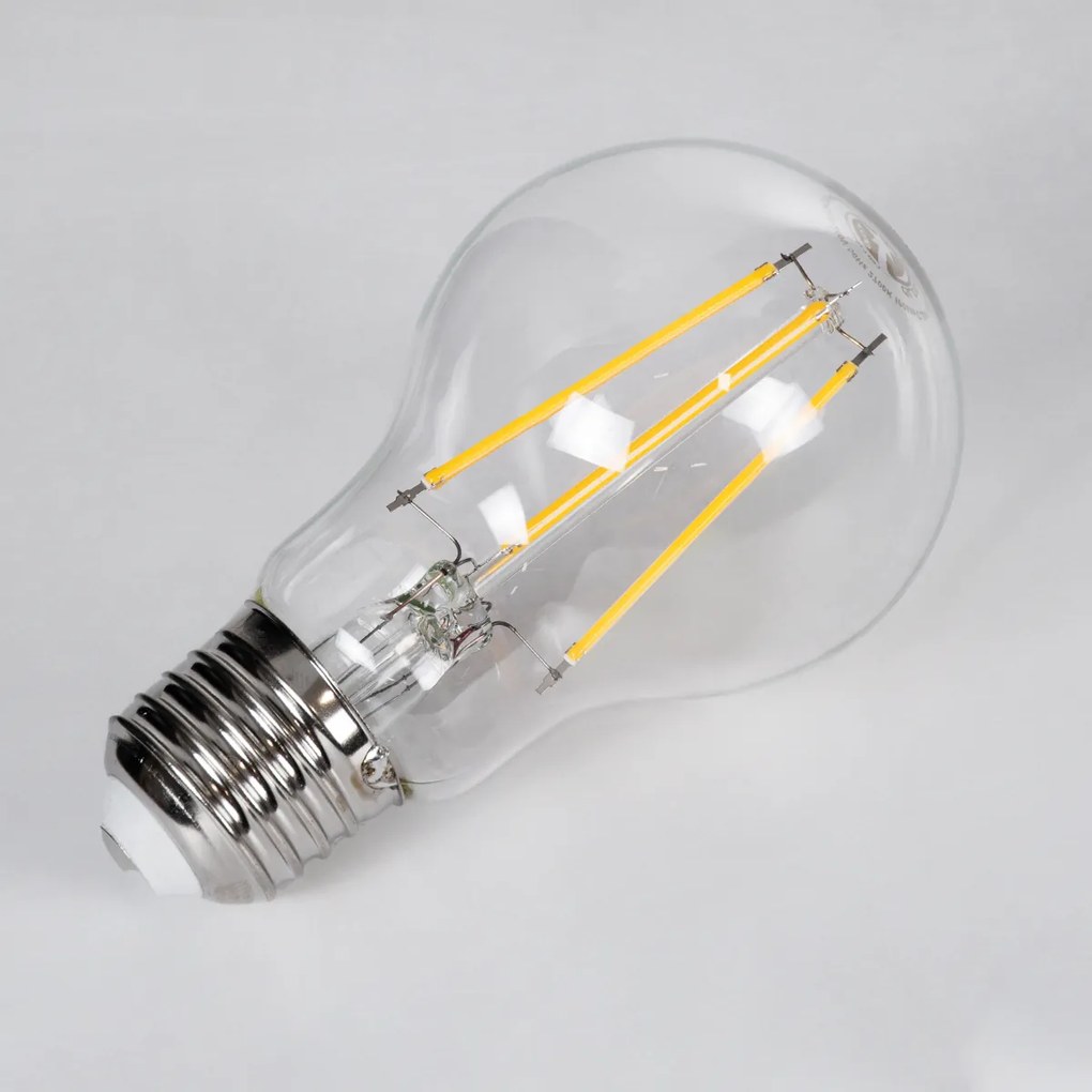 GloboStar® 99008 Λάμπα LED Long Filament E27 A60 Γλόμπος 10W 1000lm 360° AC 220-240V IP20 Φ6 x Υ10.5cm Θερμό Λευκό 2700K με Διάφανο Γυαλί - Dimmable - 3 Years Warranty