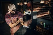 Φωτογραφία One hairdresser cutting hair of a, South_agency