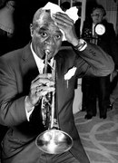 Φωτογραφία Louis Armstrong during a conference at the Savoy Hotel, 1956