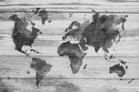Εικόνα ασπρόμαυρου χάρτη με περίγραμμα φελλού σε ξύλινο φόντο