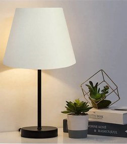 Μεταλλικό επιτραπέζιο φωτιστικό με ένα λευκό υφασμάτινο καπέλο