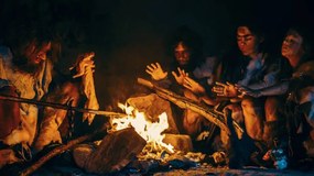 Εικονογράφηση Neanderthal or Homo Sapiens Family Cooking, gorodenkoff