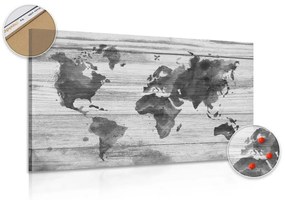Εικόνα ασπρόμαυρου χάρτη με περίγραμμα φελλού σε ξύλινο φόντο