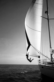 Φωτογραφία Woman jumping from a yacht into the ocean., Mint Images