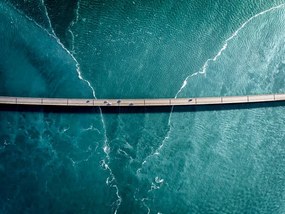 Φωτογραφία Driving on a bridge over deep blue water, HRAUN