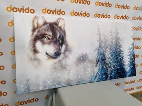 Εικόνα ενός λύκου σε ένα χιονισμένο τοπίο