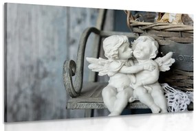 Εικόνα αγαλματίδια αγγέλων σε ένα παγκάκι